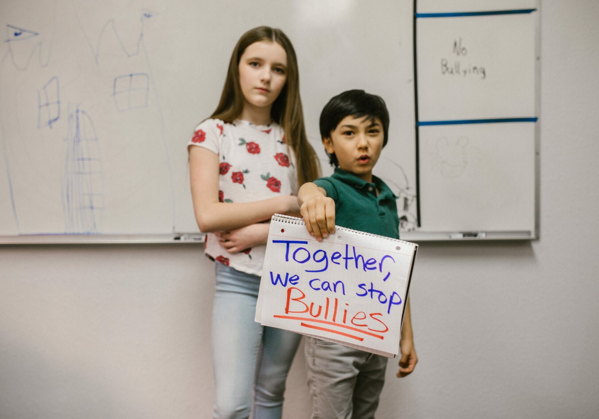 Children-holding-sign-together-we-can-stop-bullies